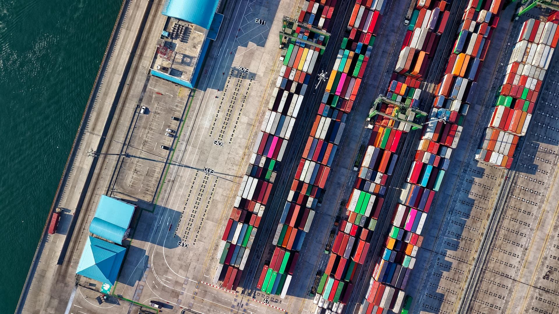 Aerial view of container port representing maritime operations at scale