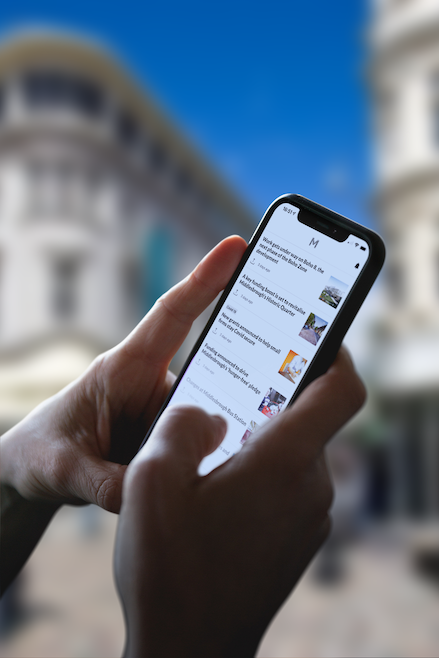 An image of the Visit Middlesbrough app being used in public